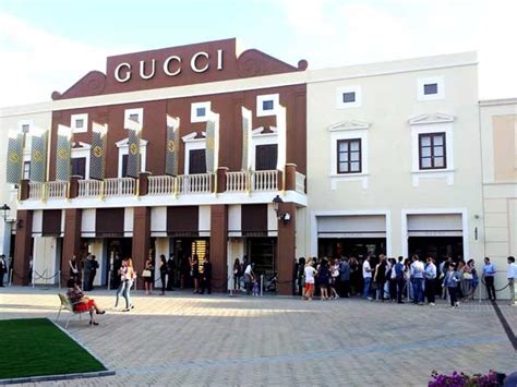 sicilia outlet village negozi gucci|gucci outlet palermo catania.